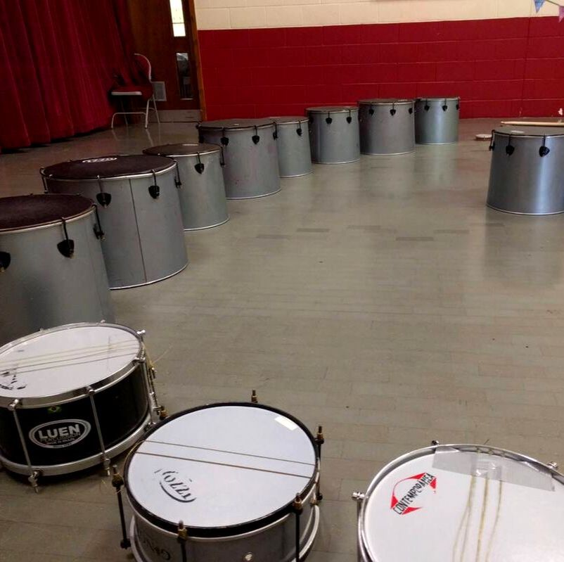 Surdo bass drums layed out ready for a teambuilding event